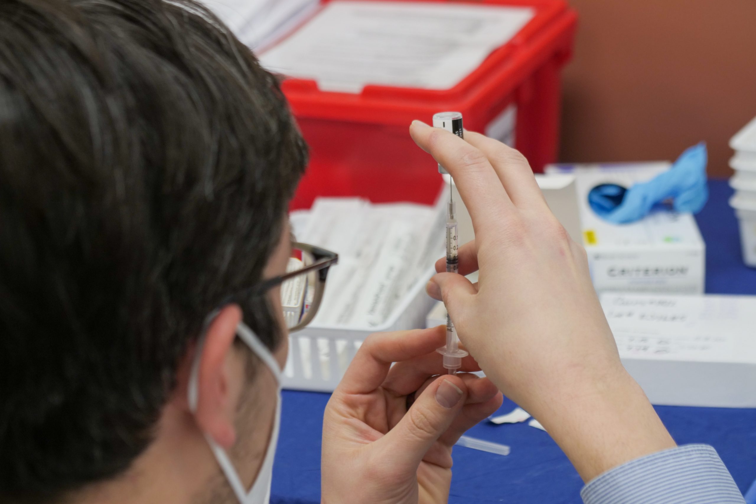 person with syringe