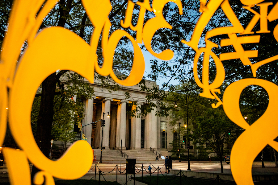 Looking through "Alchemist" sculpture toward MIT's main entrance